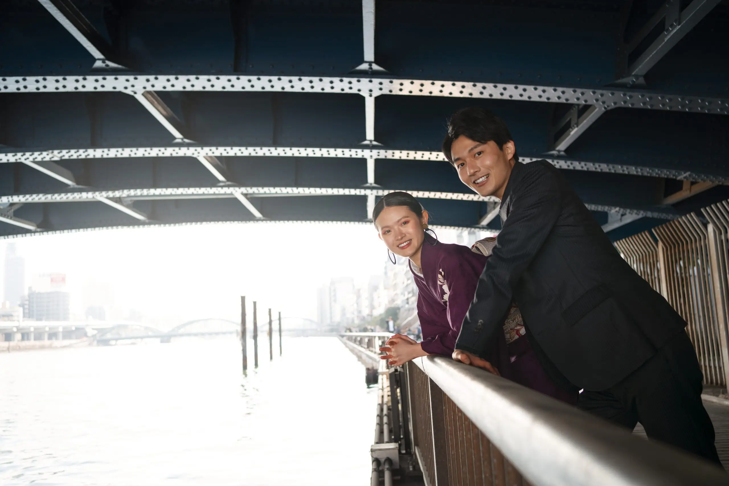 Japanese couple posing bridge celebrating coming age day – Cruise Line Placement